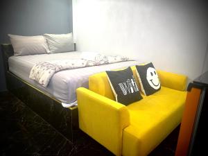 Postel nebo postele na pokoji v ubytování Bankhunchang Ramkhamhaeng hotel