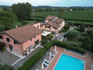 an aerial view of an estate with a swimming pool at Casa San Marco in Castelnuovo del Garda