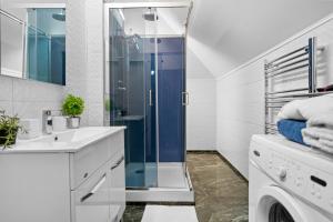 Et badeværelse på Apartment near Romexpo & Herastau Park