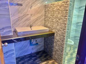 Koupelna v ubytování Bankhunchang Ramkhamhaeng hotel