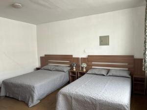 Postel nebo postele na pokoji v ubytování Casa Extremadura