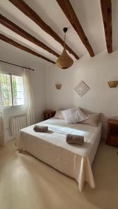 Ένα ή περισσότερα κρεβάτια σε δωμάτιο στο Villa Cas Ramons +70 φωτογραφίες