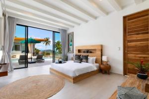 a bedroom with a bed and a large window at Amazing Luxury Villa in Ban Thung +51 photos