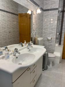 Koupelna v ubytování Csók Apartmanház
