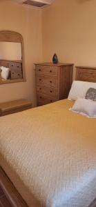 Postel nebo postele na pokoji v ubytování Chinna Cottage