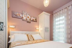 Posteľ alebo postele v izbe v ubytovaní Villa De Luxe