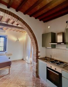 Kuchyň nebo kuchyňský kout v ubytování Rocca d'Orcia Suites and Villas
