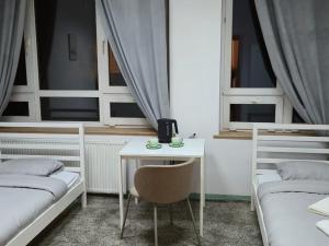 Postel nebo postele na pokoji v ubytování Alliance Hostel