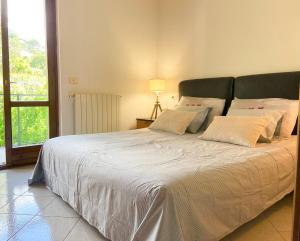 Ένα ή περισσότερα κρεβάτια σε δωμάτιο στο River house