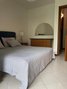 Ένα ή περισσότερα κρεβάτια σε δωμάτιο στο River house +39 φωτογραφίες