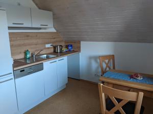 Kuchyň nebo kuchyňský kout v ubytování Ferienwohnung Apfelgarten