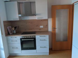Kuchyň nebo kuchyňský kout v ubytování Ferienwohnung Apfelgarten