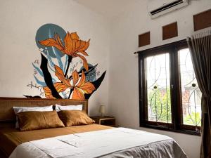 מיטה או מיטות בחדר ב-Zzz Hostel Ijen