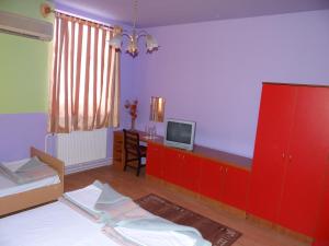 Kama o mga kama sa kuwarto sa Naša Tvrđava Guest Accommodation