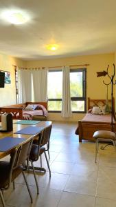 Et opholdsområde på Duplex con vista al Lago