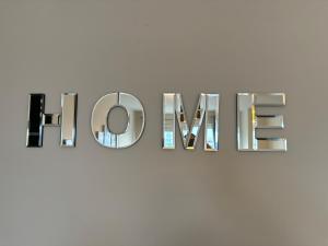 a sign for a store that reads i love at AB11 Apartments - Portland Street in Aberdeen