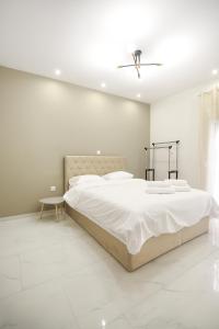 Ένα ή περισσότερα κρεβάτια σε δωμάτιο στο #3 Ioanna Apartments