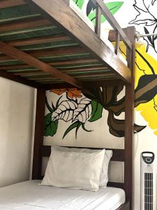 מיטה או מיטות בחדר ב-Zzz Hostel Ijen
