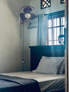 מיטה או מיטות בחדר ב-Zzz Hostel Ijen