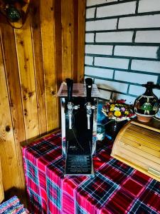 a laptop sitting on top of a table at Chata Juliana in Malý Lipník +29 photos