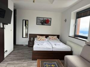 Postel nebo postele na pokoji v ubytování Apartman Panorama 1001 + 27 fotografií