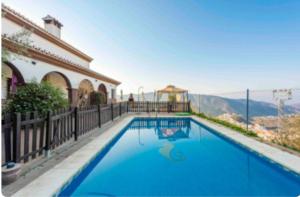 Swimmingpoolen hos eller tæt på Casa Rural Los Hidalgos