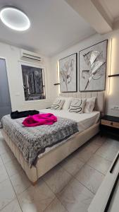 Postel nebo postele na pokoji v ubytování ARPA apartment