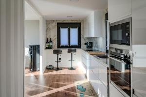 Kuchyň nebo kuchyňský kout v ubytování Casa Areas