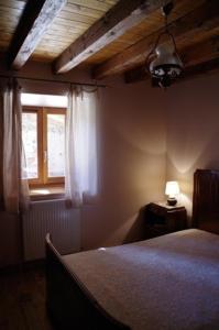 Ένα ή περισσότερα κρεβάτια σε δωμάτιο στο gîte le Val d'Ance