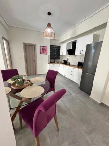 Kuchyň nebo kuchyňský kout v ubytování Feels Like Home 2 - Agrinio Suites