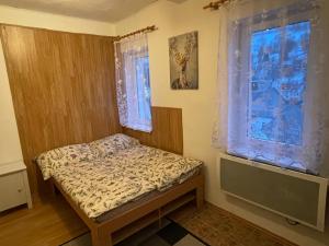 Postel nebo postele na pokoji v ubytování Horský apartmán