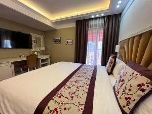 Postel nebo postele na pokoji v ubytování Hotel Brais