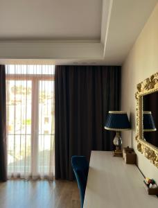 TV a/nebo společenská místnost v ubytování Hotel Brais