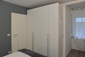 Postel nebo postele na pokoji v ubytování Appartamento in centro - Andalo