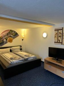 Postel nebo postele na pokoji v ubytování Hotel Bären Amriswil