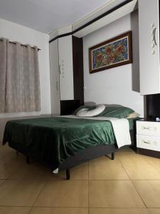 Katil atau katil-katil dalam bilik di Casa de campo em Gaspar +24 gambar