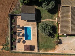 an overhead view of a house with a swimming pool at Son Sea Villa in Campos