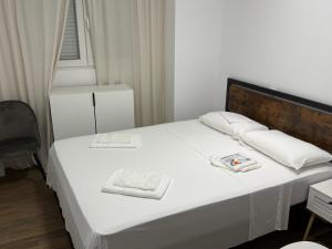Postel nebo postele na pokoji v ubytování HS Beach