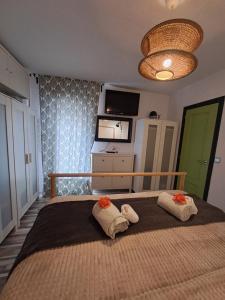 Łóżko lub łóżka w pokoju w obiekcie Apartamento CANELA