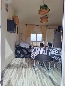 Telewizja i/lub zestaw kina domowego w obiekcie Apartamento CANELA