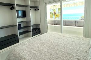 Posteľ alebo postele v izbe v ubytovaní MI CAPRICHO A12 - Luxury Beachfront Apartment- Costa del Sol