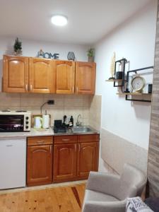Eldhús eða eldhúskrókur á Simic Apartmani Tara