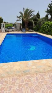 Πισίνα στο ή κοντά στο Villa with 4 Bedrooms and 2 Bathrooms and 1 Pool