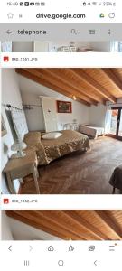Postel nebo postele na pokoji v ubytování B&B Nuovo Capo Altano