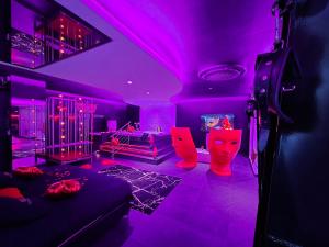 Ein Sitzbereich in der Unterkunft Les Secrets Rooms