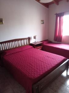 Postel nebo postele na pokoji v ubytování La Rosa