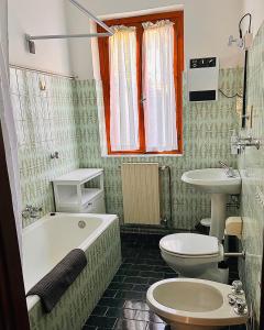 Koupelna v ubytování Good Stay Borno + 26 fotografií