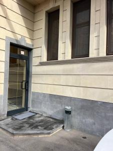 a building with a door and a window on it at AL SHEIKH 5 BEDROOM LUXURY APARTMENT 1 in Yerevan
