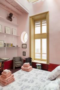 Postel nebo postele na pokoji v ubytování Ninù Roma centro storico + 22 fotografií