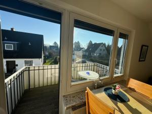 a balcony with a view of a frisbee at Haus Ostseestrand36 in Timmendorfer Strand